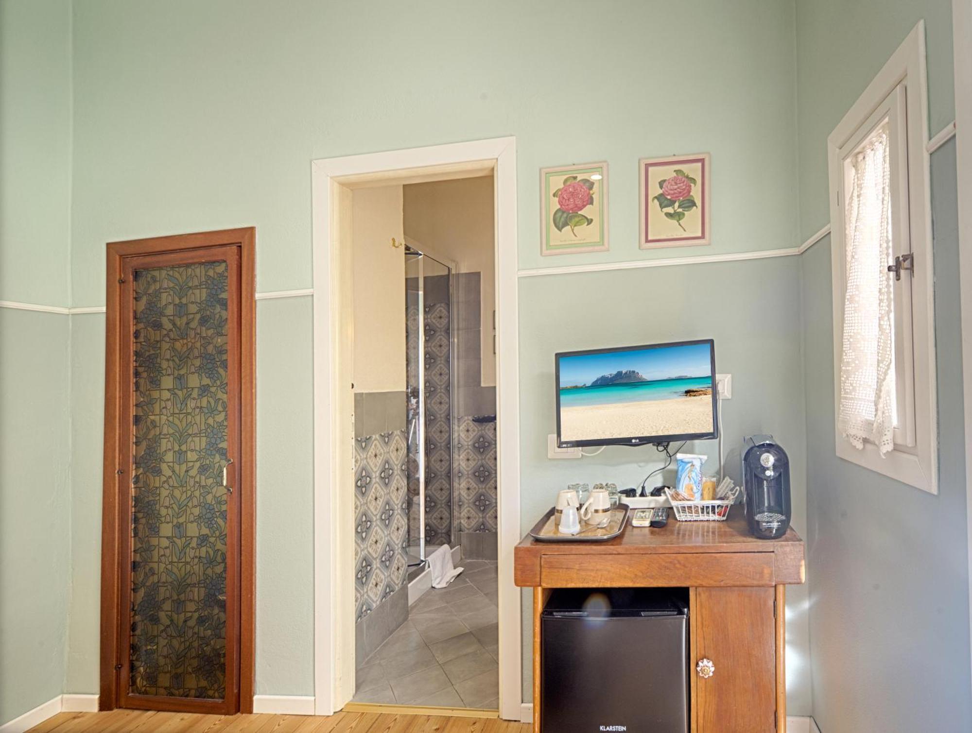 Hotel Casa Satta 1925 Olbia Habitación foto